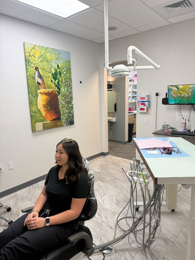 A treatment room at the E Grant Rd practice, chair ready beside the instrument tray